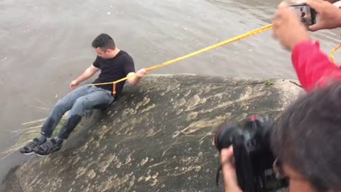 Journalist Forgoes His Story To Save Puppy From Floodwaters