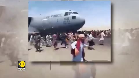 Terrifying_video_of_Afghans_falling_off_a_US_military_plane_|_Desperate_youth_hang_on_to_US_plane