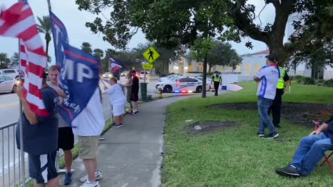 PATRIOTS WAIVING FLAGS IN ORMOND BEACH, FL