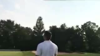 Golf cart hits guy white shirt and khaki shorts falls backwards into cart