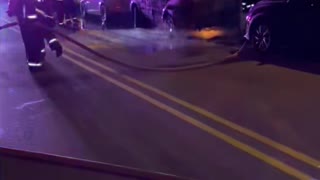 Fire Department Hoses Down Flaming Car