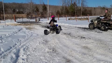 Girl wheeling in the snow