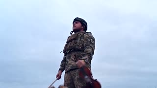 Moisey Bondarenko who now serves in the Ukrainian Army, plays his violin right on the frontlines.