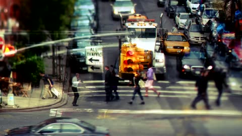 Exposure video of a street with traffic and people