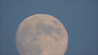 Moonrise During Sunset