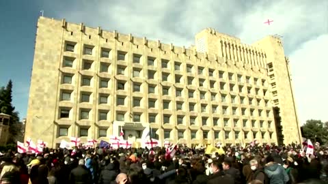 Protesters rally on steps of Georgian parliament