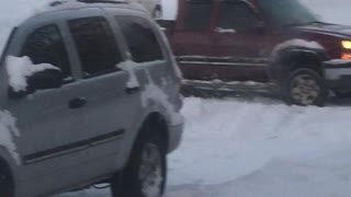 Tow Truck Stuck in Snow Saved by Truck