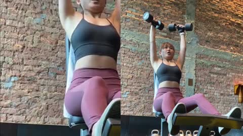 Beautiful girl lifting weights that can do