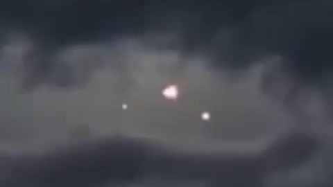 UFOs CHARIOTS OF GOD ANGELS IN DARK CLOUDS PULSATE BEFORE DISAPPEARING🕎Isaiah 66;16”FIRE HIS SWORD”