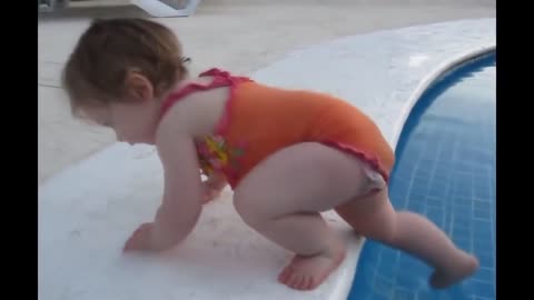 Funny video-cute baby enjoying at the pool