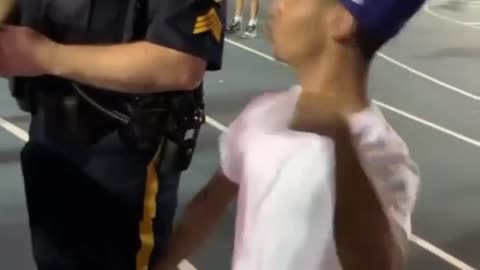 Dance battle between Street dancer and Cop