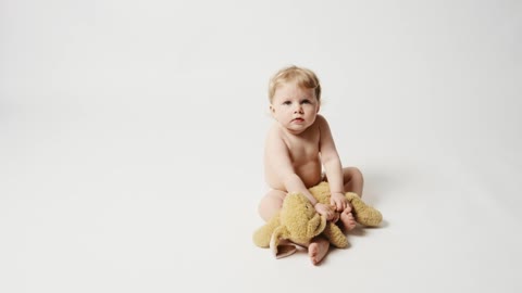 Baby girl in a photo studio