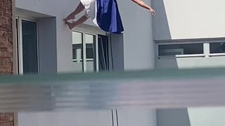 Woman Dances On Wall Side