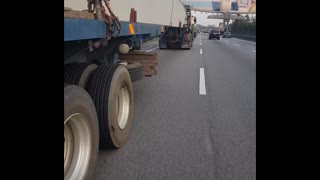 Sketchy Motorcycle Maneuver Under Semi Truck