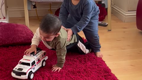 Baby karim’s playing 🚐.the Oder brother is sitting on the top of the younger brother 😱