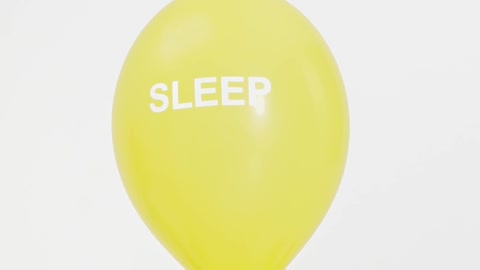 Word Sleep Printed on a Yellow Balloon