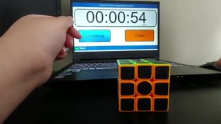 Talented dude solves Rubik's cube less than a minute