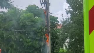 Pole Catches Fire After Being Hit By Lightning