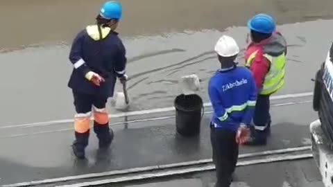 Transnet responds to viral video of workers using makeshift tools and a bucket to remove rainwater