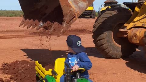 Boy Gets Toy Tractor Loaded by Real Excavator