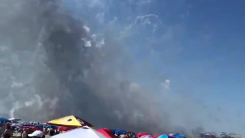 Fireworks truck explodes on beach causing people to run for their lives