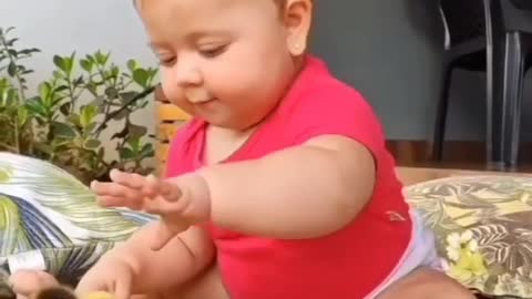 Cute Baby playing hen kitty