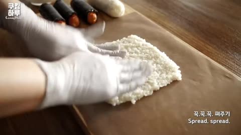 Roll The Rice Into A Cylindrical Shape