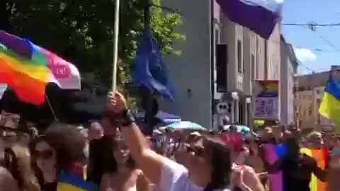 LGBT parade in support of yellow and blue flags in Munich