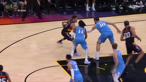 Devin Booker drops Terance Mann by hitting him in the nuts