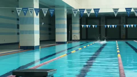 A man preparing for a swimming competition.