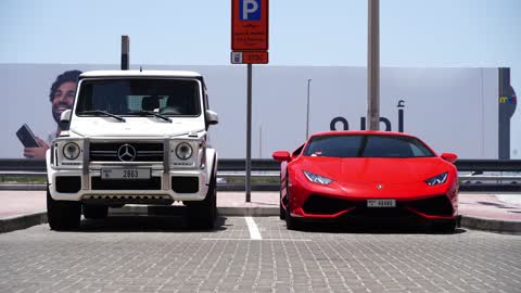 luxury Cars lamborghini and mercedes Parked in a Paid Parking.