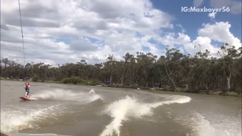 Woman does front flip trick on wakeboard and goes under water