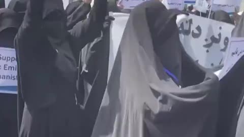 Fully covered Afghan women at a pro-Taliban protest on September 11