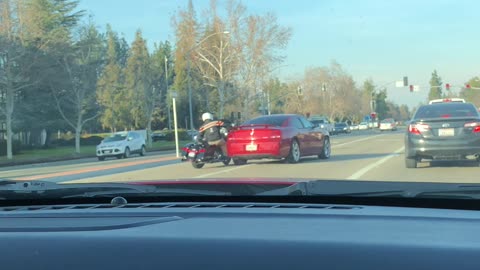 Angry Driver Clips Lane Splitting Motorcyclist