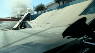 Semi Truck Goes Airborne Over Utility Bridge