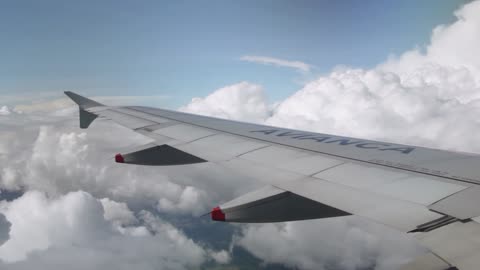 Airplane Wing while Flying in the Sky