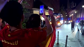 Victorious Spain team arrive at hotel trophy in hand