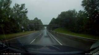 Tree Falls over Slick Highway