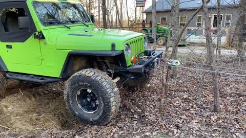 Stump Extraction with a Jeep, Tire, and 9k Winch