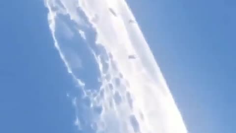 Real video of the Moon showing flying objects entering the Moon surface