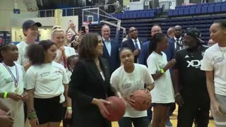 Kamala Harris plays basketball with Students