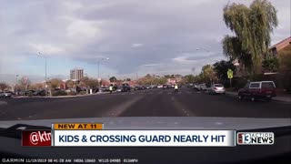 Kids, crossing guard almost hit by car near school