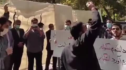 Iran - Tehran University students protesting as regime president visits