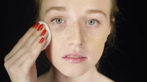 The beauty of human skin for a woman wiping her face