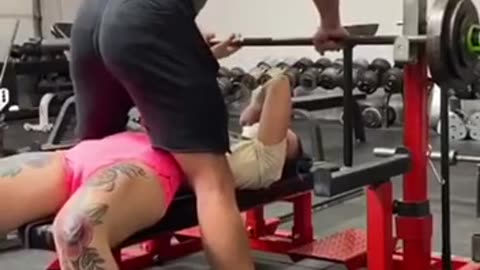 Woman almost crushed while lifting weights