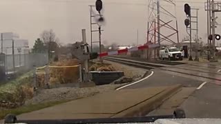 DamCam Captures Police Officer Escaping Near Death At Train Tracks