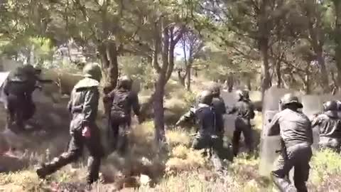 1000's of illegal immigrants armed with knives & stones storm the border bw Morocco and Spain