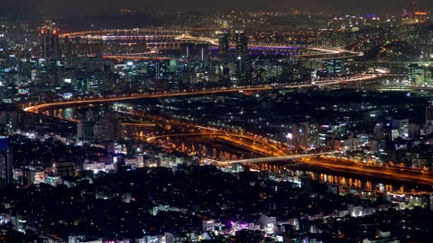 Colossal city illuminated at night