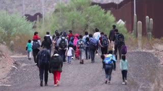 'Floodgates' at the border wall in Arizona are left wide open as illegal immigrants file in