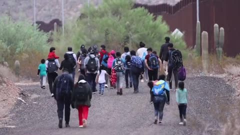 'Floodgates' at the border wall in Arizona are left wide open as illegal immigrants file in